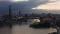 Panorama of the pond and Yekaterinburg Iset skyscraper. Stock footage. Aerial view of Dinamo building with round orange