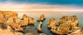 Panorama of Ponta da Piedade rock formations near touristic village Lagos in the Algarve, Portugal at sunset Royalty Free Stock Photo