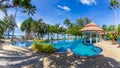 Panorama of Pool with coconut trees and beautiful beach as background at Koh Chang, Trat Royalty Free Stock Photo