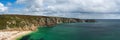 Panorama of the Porthcurno Beach nad Logan Rock, Lands End, Cornwall, England Royalty Free Stock Photo