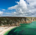 Panorama of the Porthcurno Beach nad Logan Rock, Lands End, Cornwall, England Royalty Free Stock Photo