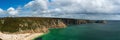 Panorama of the Porthcurno Beach nad Logan Rock, Lands End, Cornwall, England Royalty Free Stock Photo