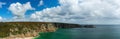 Panorama of the Porthcurno Beach nad Logan Rock, Lands End, Cornwall, England Royalty Free Stock Photo