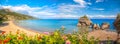 Panorama of Porto Zorro beach against colorful flowers on Zakynthos island, Greece Royalty Free Stock Photo