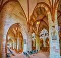 Panorama of the prayer hall of Basel Minster Cathedral with stone arcades, on April 1 in Basel, Switzerland