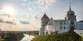 Panorama promenade overlooking the old city and historic buildings of medieval castle near bridge and wide river