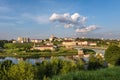 Panorama promenade overlooking the old city and historic buildings of medieval castle near wide river with huge bridge
