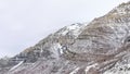 Panorama Provo Canyon mountain with steep rugged slopes dusted with snow in winter