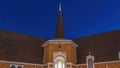 Panorama Provo Utah church with stained glass windows and spire at the entrance