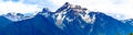 Panorama of the pyramid shaped rugged top of Cheam Mountain, or Cheam Peak, that towers over the Fraser Valley of British Columbia