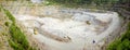 panorama of quarry of granite with machines on the production