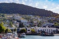 Panorama of Queenstown, Otago, New Zealand with hillside houses rising from the shores of lake Wakatipu.