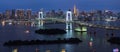 Panorama of Rainbow Bridge at night, Tokyo, Japan Royalty Free Stock Photo