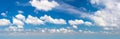 Panorama of real blue sky during daytime with white light clouds Freedom and peace. Large photo format Cloudscape Royalty Free Stock Photo