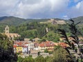 Prats-de-Mollo with church of Saint-Juste-et-Sainte-Ruffine, Fort Lagarde, and mountains, Pyrenees Orientales, southern France Royalty Free Stock Photo