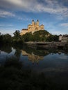 Panorama reflection of baroque Stift Melk Benedictine abbey monastery church in Danube river Wachau valley Lower Austria