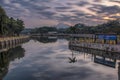 Panorama reflection, Tambakboyo dam at sunrise with motion clouds