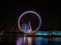 Panorama reflection of tourist ferris wheel Millennium London eye in Thames river at night England Great Britain UK Royalty Free Stock Photo