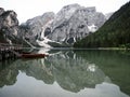 Panorama reflection boat house of Lago di Braies Pragser Wildsee alpine mountain lake Dolomites alps South Tyrol Italy Royalty Free Stock Photo