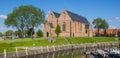 Panorama of the reformed church in the historic harbor of Vollenhove Royalty Free Stock Photo