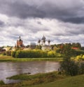 Panorama of the river and ancient Orthodox Tikhvin Bogorodichny Uspensky Male Monastery