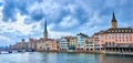 Panorama of the riverside housing of Limmat river with Peterskirche and Fraumunster churches, Zurich, Switzerland Royalty Free Stock Photo