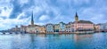 Panorama of the riverside housing of Limmat river with Peterskirche and Fraumunster churches, Zurich, Switzerland Royalty Free Stock Photo