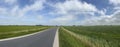 Panorama from a road through farmland around Tzum