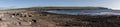 Panorama of Rocky beach with Cliffs of Moher in background Royalty Free Stock Photo