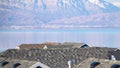 Panorama Roofs of residential houses against Utah Lake