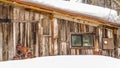 Panorama Rustic cabin with brown wooden walls in Park City Utah mountain in winter