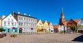 Panorama of Rynek main market square with Holy Mary gothic church in old town quarter of Trzebiatow in Poland