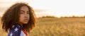 Sad Girl Woman Teenager Wrapped in USA Flag at Sunset in Field Panorama Royalty Free Stock Photo