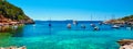 Panorama of sailboats at Cala Salada lagoon