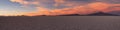 Panorama of Salar de Uyuni at sunset Royalty Free Stock Photo