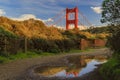 Panorama of the San Francisco Golden Gate bridge in the Marin Headlands California reflecting in a puddle after the rain Royalty Free Stock Photo