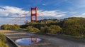 Panorama of the San Francisco Golden Gate bridge in the Marin Headlands California reflecting in a puddle after the rain Royalty Free Stock Photo
