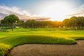 Panorama with a sand bunker on a golf course without people with a row of trees in the background during sunset Belek Royalty Free Stock Photo