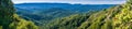 Panorama in Santa Cruz mountains with evergreen forests covering hills and valleys as seen from Castle Rock State Park, San Royalty Free Stock Photo