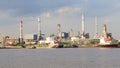 Panorama scen of heavy industry oil refinery plant beside river