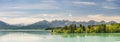 Panorama scene in Bavaria with alps mountains and lake