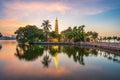 Panorama scene of Tran Quoc pagoda, the oldest temple in Hanoi, Vietnam, with brilliant sunset Royalty Free Stock Photo