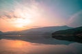 Panorama scenic of mountain lake with perfect reflection at sunrise Royalty Free Stock Photo