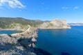Panorama of the sea mountain coast, Crimea the Black Sea coast on a sunny day . rocks on the shore, blue sky Royalty Free Stock Photo