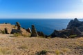 Panorama of the sea mountain coast, Crimea the Black Sea coast on a sunny day . rocks on the shore, blue sky Royalty Free Stock Photo