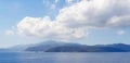 Panorama of the sea, mountains and sky with clouds on the island of Elba Royalty Free Stock Photo