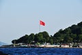 Panorama of the sea strait. Istanbul coastline with the flag of the turkish republic.