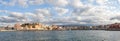 A panorama of the seaport town Chania, the island of Crete, Greece. A harbor with wooden pantons, moored yachts, ships, boats. Royalty Free Stock Photo