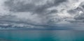 panorama seascape view of the turquoise Ionian Sea under a gray overcast sky Royalty Free Stock Photo