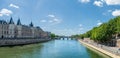 Panorama of Seine river with conciergerie and pont neuf - Paris Royalty Free Stock Photo